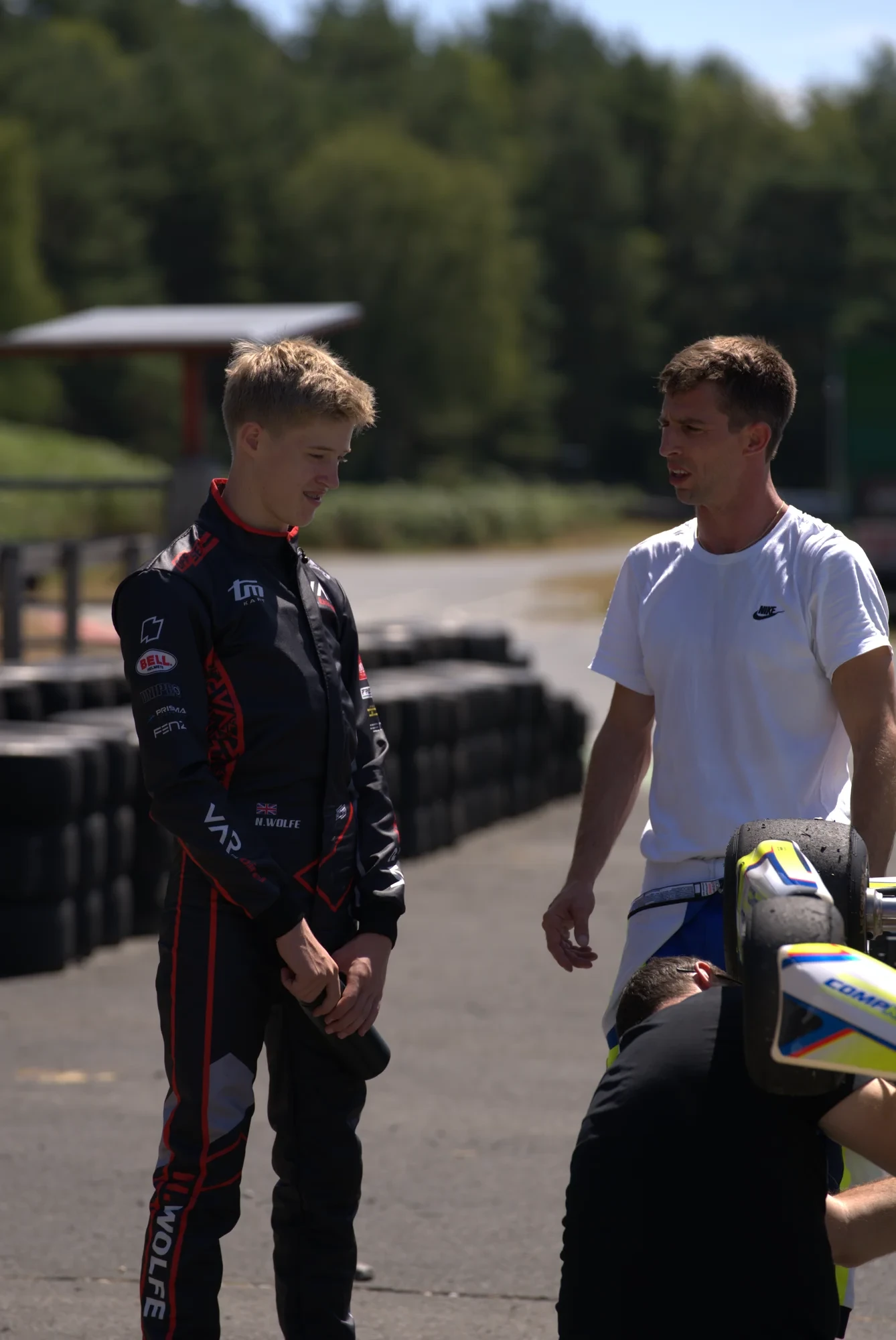 Trackside discussion between races